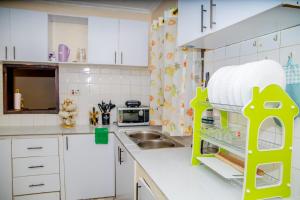Kuchyň nebo kuchyňský kout v ubytování Paradise cozy homes