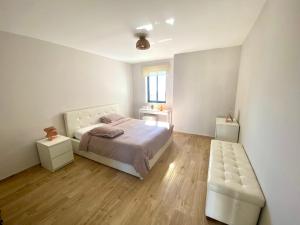 Llit o llits en una habitació de Marsascala St Thomas bay