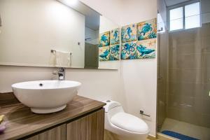 Koupelna v ubytování Penthouse Edificio Wind Playa Salguero + 41 fotografií