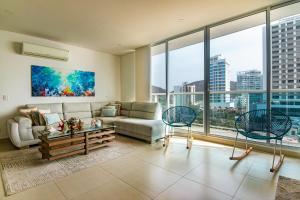 Posezení v ubytování Penthouse Edificio Wind Playa Salguero