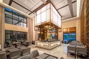 Poltton International Hotel - Chaozhou Hanjiang的休息区