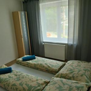 Postel nebo postele na pokoji v ubytování Dom + 7 fotografií