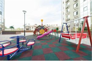 a playground with a slide and a play equipment at Astashkina in Odesa