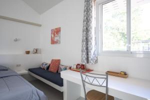 Voodi või voodid majutusasutuse Corsita Resort Koh Mak toas