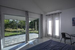 Voodi või voodid majutusasutuse Corsita Resort Koh Mak toas