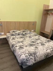 Postel nebo postele na pokoji v ubytování Le grand cerf