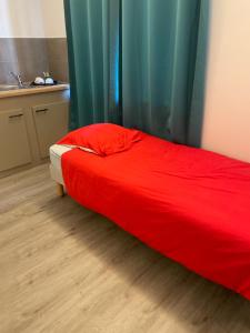 Postel nebo postele na pokoji v ubytování Le grand cerf