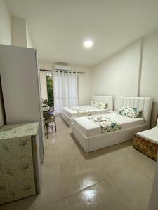 Postel nebo postele na pokoji v ubytování Arli Eris Rent rooms