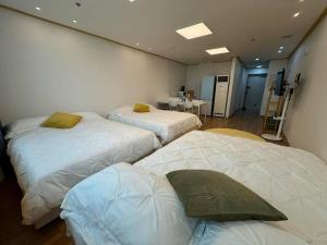 Letto o letti in una camera di Hongdae sub 1min