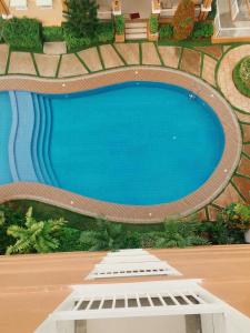Bazén v ubytování Puerto Princesa Palawan Queen Bed Studio with Pool, Gym, Security, View nebo v jeho okolí
