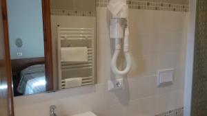Koupelna v ubytování Hotel Prati + 37 fotografií