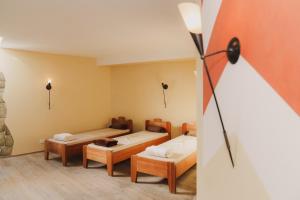 Ένα ή περισσότερα κρεβάτια σε δωμάτιο στο Saldur Small Active Hotel
