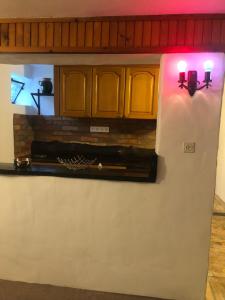 Kuchyň nebo kuchyňský kout v ubytování R&B Vendégház