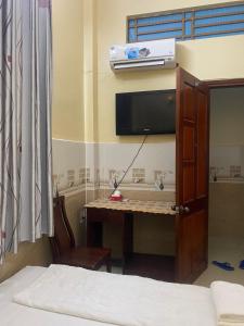 Postel nebo postele na pokoji v ubytování Thanh Tâm Hotel