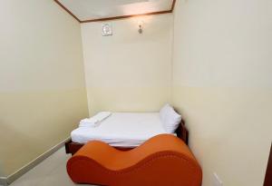 Postel nebo postele na pokoji v ubytování Thanh Tâm Hotel