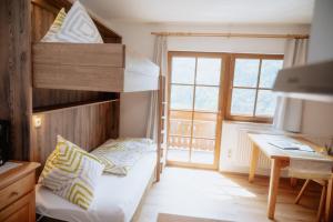 Letto o letti in una camera di Biobauernhof Poidlbauer