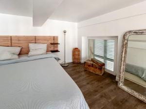 Ένα ή περισσότερα κρεβάτια σε δωμάτιο στο Élégant T3 Central avec Vue sur le Port de Toulon