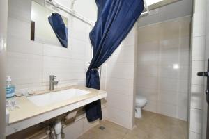 a bathroom with a sink and a toilet at Sirik in Geghanist