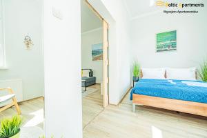 Postel nebo postele na pokoji v ubytování Baltic Apartments - Willa Carmen