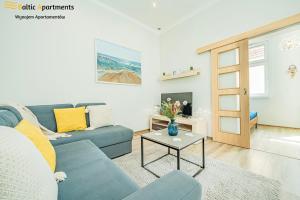 TV a/nebo společenská místnost v ubytování Baltic Apartments - Willa Carmen