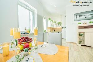 Kuchyň nebo kuchyňský kout v ubytování Baltic Apartments - Willa Carmen