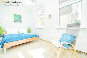 Postel nebo postele na pokoji v ubytování Baltic Apartments - Willa Carmen + 37 fotografií