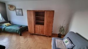 Posteľ alebo postele v izbe v ubytovaní roomsy Kolobrzeska