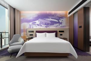 Letto o letti in una camera di Hampton by Hilton Guigang