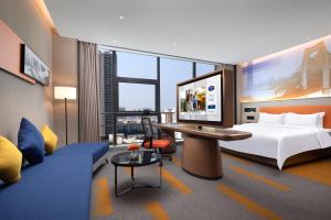 Letto o letti in una camera di Hampton by Hilton Guigang
