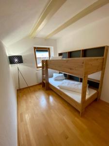 Postel nebo postele na pokoji v ubytování Rieder Stubn Lodge