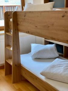 Postel nebo postele na pokoji v ubytování Rieder Stubn Lodge