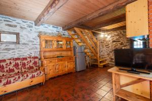 A kitchen or kitchenette at Baita Tomaselli