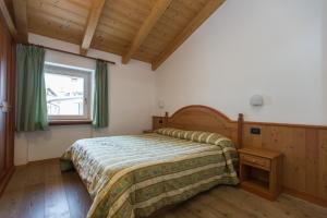 Postel nebo postele na pokoji v ubytování Casa Tomaselli