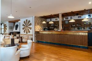 The lounge or bar area at Hotel Araxa - Adults Only