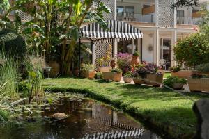 A garden outside Hotel Araxa - Adults Only