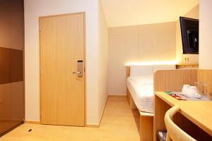 Postel nebo postele na pokoji v ubytování Coliwoo Orchard - CoLiving