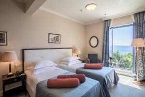 Posteľ alebo postele v izbe v ubytovaní Hotel Park Split
