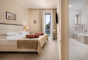 Posteľ alebo postele v izbe v ubytovaní Hotel Park Split