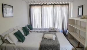 Postel nebo postele na pokoji v ubytování Element Riders Place Backpackers