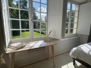 Un ou plusieurs lits dans un hébergement de l'établissement L'APPART enTHÈSE - Appartement pour une ou deux pers - Accessible à Tous - Meuble Tourisme 3 étoiles en BOURGOGNE