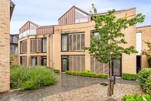 an exterior view of an apartment building at Tailored Stays - Central Cambridge, River Walk Apartments in Cambridge