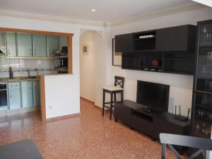 Η κουζίνα ή μικρή κουζίνα στο Malvarrosa, 1-6 +11 φωτογραφίες