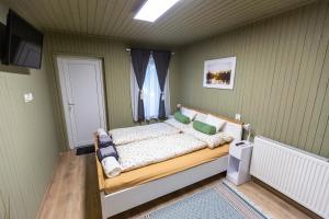 Postel nebo postele na pokoji v ubytování Park Apartman