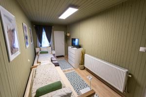 TV a/nebo společenská místnost v ubytování Park Apartman