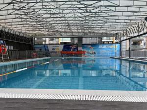 Bazén v ubytování 佛山敏卓酒店Mentor Hotel nebo v jeho okolí