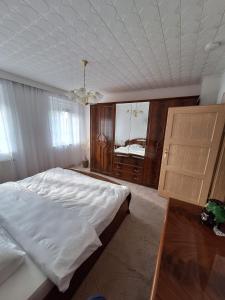 Postel nebo postele na pokoji v ubytování FeWo AGA