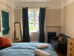 Ένα ή περισσότερα κρεβάτια σε δωμάτιο στο Lovely rooms in Somerset