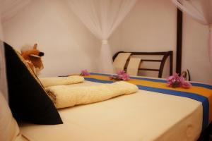 Voodi või voodid majutusasutuse Sigiri Mount Villa & Restaurant toas