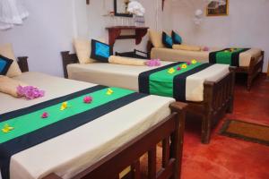 Voodi või voodid majutusasutuse Sigiri Mount Villa & Restaurant toas