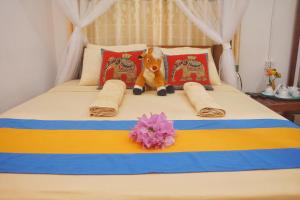 Voodi või voodid majutusasutuse Sigiri Mount Villa & Restaurant toas